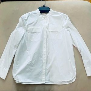Tory Burch White button down blouse. Never worn. Comes with tags.
